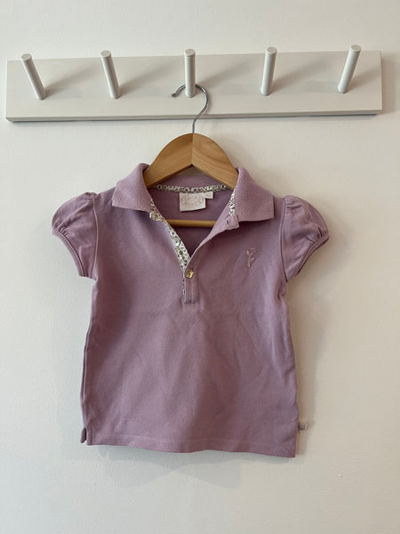 Noukie's purple polo shirt (12-18m)