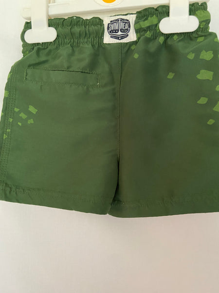 Next green swimming shorts (9-12)